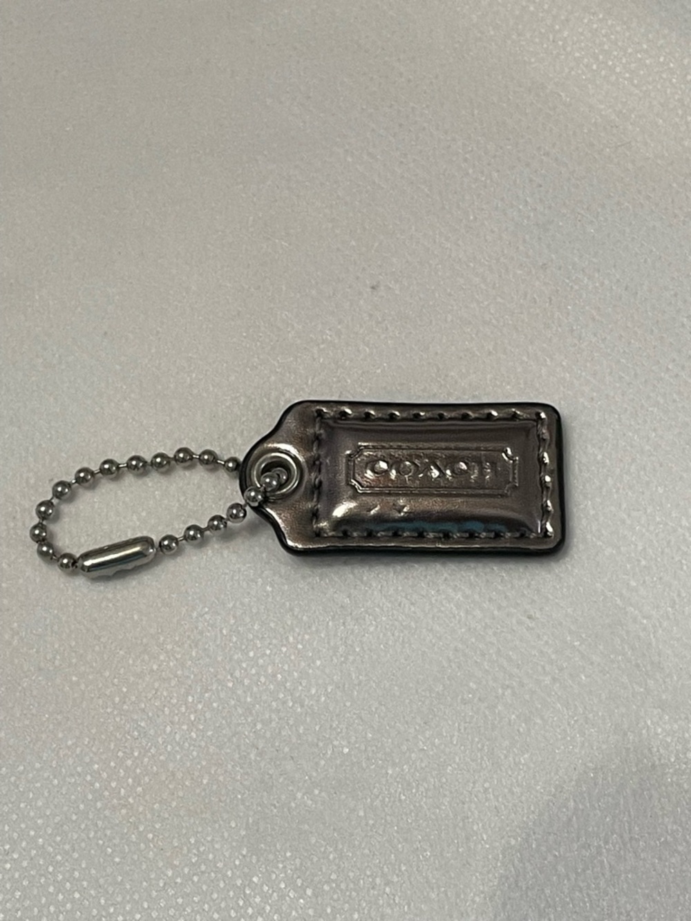 ❌NOT FOR SALE ❌Coach Metallic Silver Leather Tag Key Fob with Ball Chain